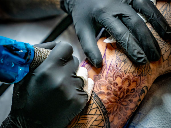 Travis applying ink