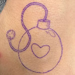 stencil of the love bomb on skin
